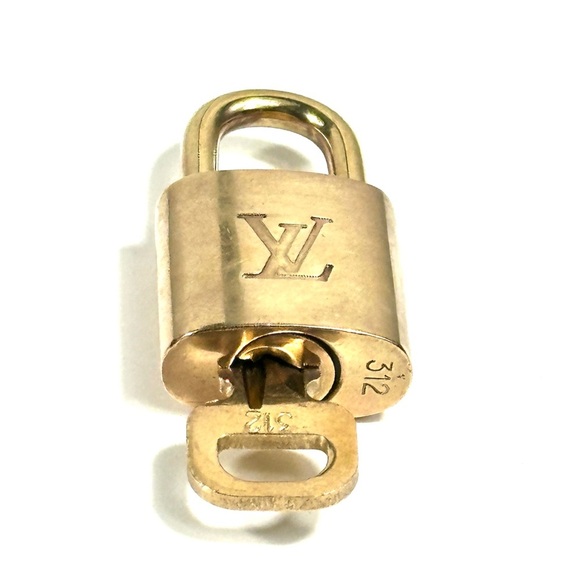 Louis Vuitton Accessories - Louis Vuitton lock with key 312
